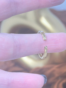 Gold plated ring coated in resin with real pressed yellow flower cast inside with resin.
