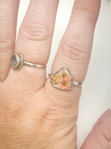 925 Sterling Silver Adjustable Ring-Coral and White flowers cast inside resin.