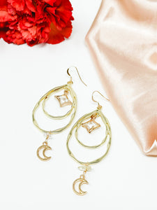 Tear Drop hoops earrings with moon dangles and clear quartz crystals.