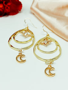 Tear Drop hoops earrings with moon dangles and clear quartz crystals.