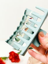 Load image into Gallery viewer, Sky Blue Claw Clip Infused with Real Flowers in Resin.