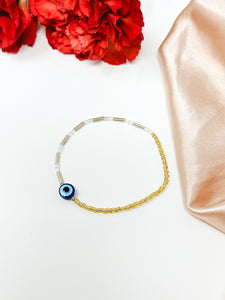 Gold and Pearl Colored Beaded Evil Eye Bracelet