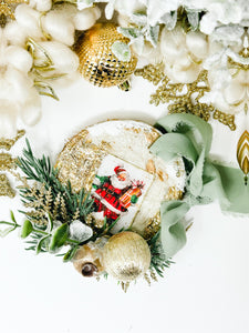 Vintage Santa with holiday foliage