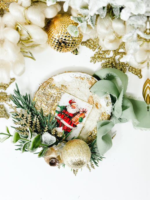 Vintage Santa with holiday foliage