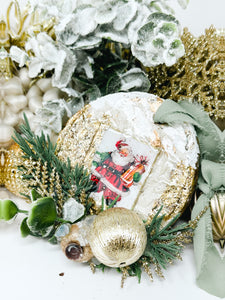 Vintage Santa with holiday foliage