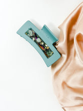 Load image into Gallery viewer, Sky Blue Claw Clip Infused with Real Flowers in Resin.