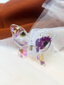 Matte Blue Butterfly Clip Infused with Real Flowers in Resin.