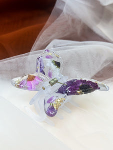Matte Blue Butterfly Clip Infused with Real Flowers in Resin.