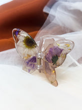 Load image into Gallery viewer, Matte Gray Butterfly Clip Infused with Real Flowers in Resin.
