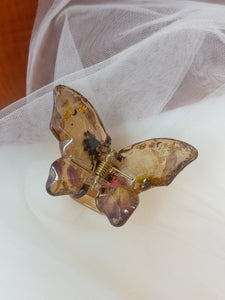 Crystal Brown Butterfly Clip Infused with Real Flowers in Resin.