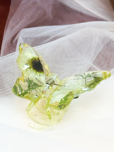 Crystal Green Butterfly Clip Infused with Real Flowers in Resin.