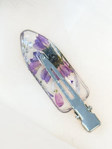 Clear No dent resin clip with Real Purple Daisy Flowers Cast Inside.