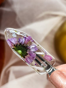 Clear No dent resin clip with Real Purple Daisy Flowers Cast Inside.