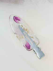 Clear No dent resin clip with Real Pink and White Toned Flowers Cast Inside.