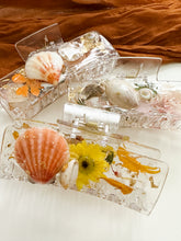 Load image into Gallery viewer, Beachy Shells- Clear Claw Clips Infused with Real Pressed Flowers Cast in Resin. MADE TO ORDER: Choose Your Own Flowers. (Copy)