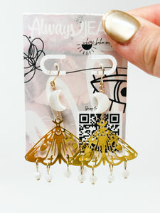 Moon pearl moth charm quartz earrings.