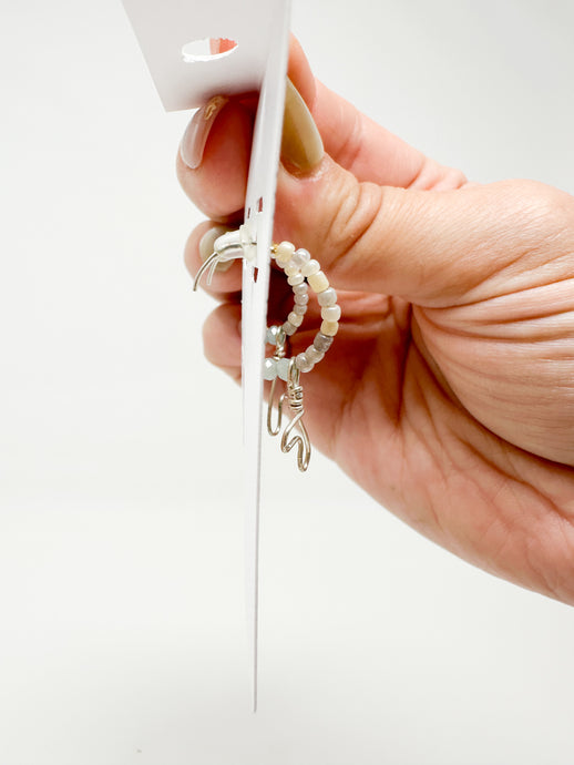 Beaded sterling silver heart hoops.