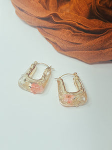 Resin hoops with real pressed flowers inside