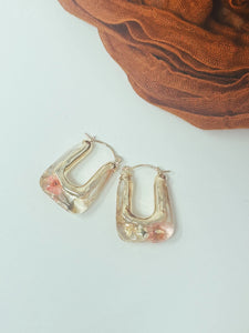 Resin hoops with real pressed flowers inside