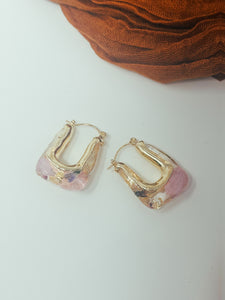 Resin hoops with real pressed pink and purple flowers inside