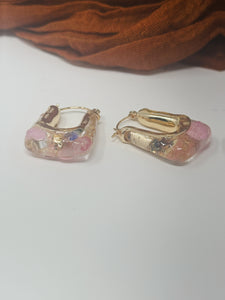 Resin hoops with real pressed pink and purple flowers inside