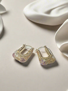 Resin hoops with real pressed flowers inside