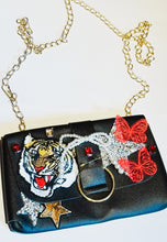 Load image into Gallery viewer, Faux Leather small clutch with fun patches and a classy gold chain for a strap.