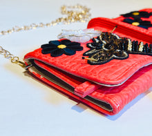 Load image into Gallery viewer, Faux red leather small clutch wallet with bee and flower patches and a gold chain strap.