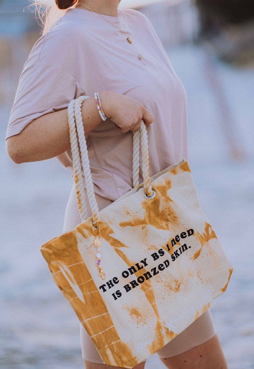The only BS I need is....Beach Tote bag &UV beach keychain Clip.
